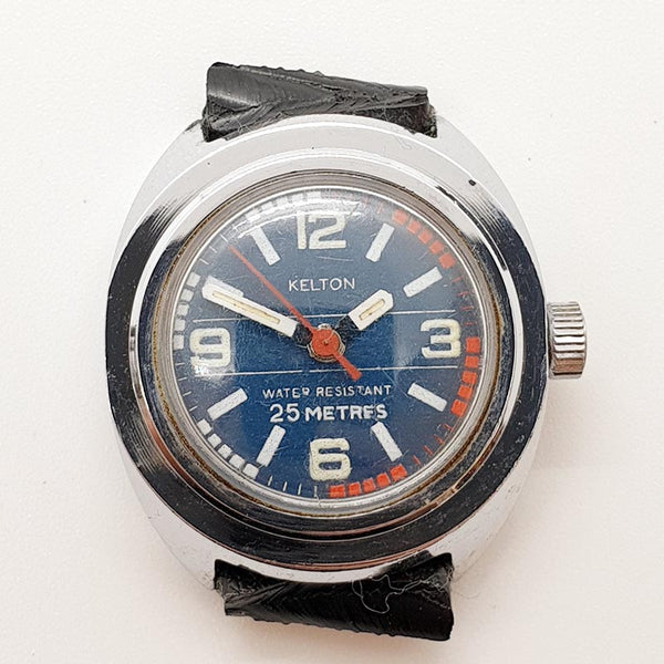 Kelton بواسطة Timex ساعة بميناء أزرق من بريطانيا العظمى لقطع الغيار والإصلاح - لا تعمل