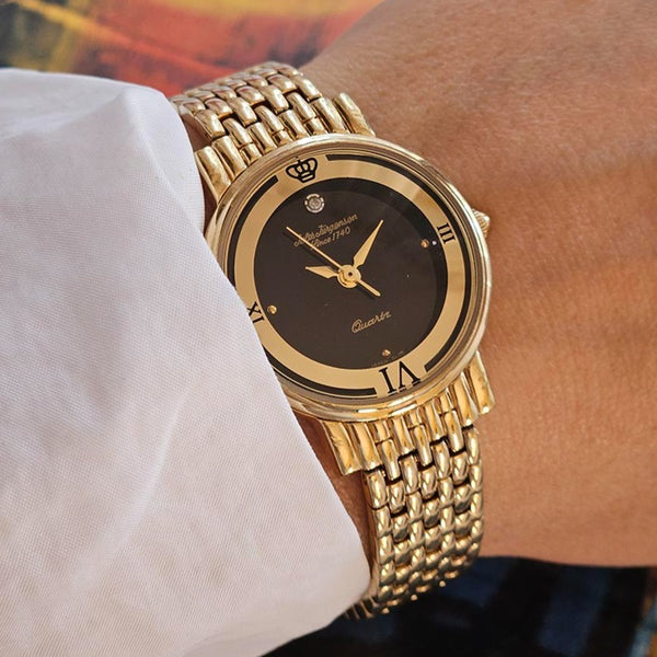 Tono de oro vintage Jules Jurgensen reloj para mujeres con dial negro