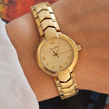 Vintage Gold-Tone Elgin Quartz Watch for Ladies with Champagne Dial