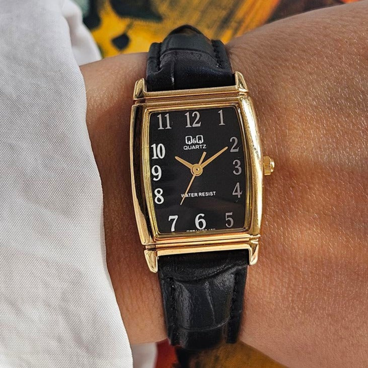 Q&Q de dial negro rectangular vintage por Citizen Cuarzo reloj