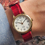 Vintage Gold-tone Timex Indiglo Ladies' Watch with Textured Red Strap