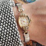 Vintage gold-tone Bulova ladies watch on the wrist 
