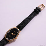 Vintage Black-Dial SM Watch for Ladies Gold-tone Oval Case & Black Strap