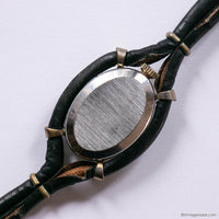 Tiny Vintage Celhor Watch for Women with Oval-Shaped Dial & Black Strap
