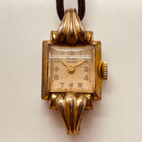 ساعة "آرت ديكو رووا" المطلية بالذهب عيار 15 روبية من خمسينيات القرن الماضي لقطع الغيار والإصلاح - لا تعمل