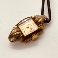 ساعة "آرت ديكو رووا" المطلية بالذهب عيار 15 روبية من خمسينيات القرن الماضي لقطع الغيار والإصلاح - لا تعمل