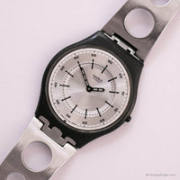 Swatch Skin ساعة فلاتينشن SFB106G | نادر 1999 Swatch Skin