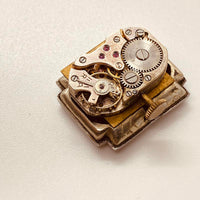 ساعة آرت ديكو 15 روبية ألمانية مطلية بالذهب من خمسينيات القرن الماضي لقطع الغيار والإصلاح - لا تعمل
