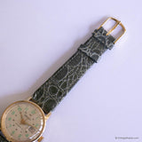 Vintage Envoy Swiss Mechanical Date Watch with Textured Green Strap - Vintage Radar