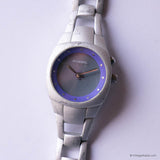 Vintage Silver-tone Fossil Watch for Women with Purple Dial