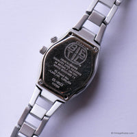 Vintage Silver-tone Fossil Watch for Women with Purple Dial