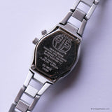 Vintage Silver-tone Fossil Watch for Women with Purple Dial