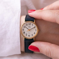 90 Timex Quartz montre pour elle avec une sangle de marine et un étui doré