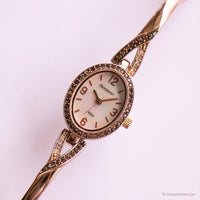 Ovalo de oro rosa vintage Armitron reloj para mujeres con piedras preciosas marrones