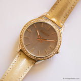 Vintage DKNY Gold-tone Watch for Women with Gemstones & Pearly Dial - Vintage Radar