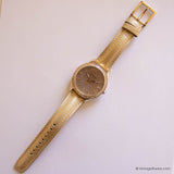 Vintage DKNY Gold-tone Watch for Women with Gemstones & Pearly Dial - Vintage Radar