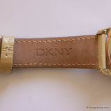 Vintage DKNY Gold-tone Watch for Women with Gemstones & Pearly Dial - Vintage Radar