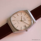 Vintage Dugena DQ280 Watch for Men with Rectangular Case & Date - Vintage Radar