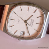 Vintage Dugena DQ280 Watch for Men with Rectangular Case & Date - Vintage Radar