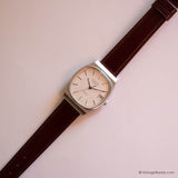 Vintage Dugena DQ280 Watch for Men with Rectangular Case & Date - Vintage Radar