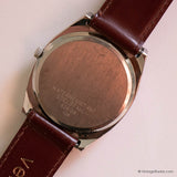 Vintage Dugena DQ280 Watch for Men with Rectangular Case & Date - Vintage Radar