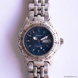 Vintage Silver-tone Armitron Day Date Watch for Women with Blue Dial