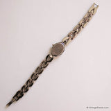 Tiny Vintage Silver-tone Regent Para Quartz Watch for Her with Oval Case - Vintage Radar