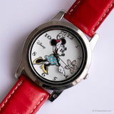 Tone argenté vintage des années 90 Minnie Mouse montre avec sangle en cuir rouge