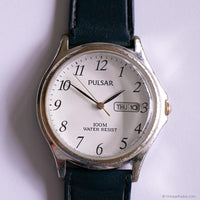 Vintage Silver-tone Pulsar Day Date Watch with White Dial & Blue Strap