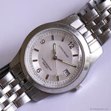 Vintage Silver-tone Longchamp Watch with Stainless Steel Bracelet