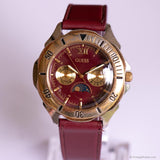 Vintage Gold-tone Guess Moonphase Watch with Burgundy Dial & Strap