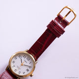 Vintage Gold-tone Timex Indiglo Ladies' Watch with Textured Red Strap