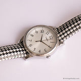 Vintage Silver-tone Timex Watch with Houndstooth Pattern Strap