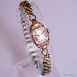 Vintage rose-gold Elgin watch with rectangular case and slim bracelet