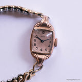 Vintage rose-gold Elgin watch with rectangular case and slim bracelet