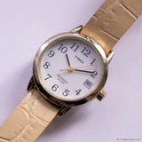 Vintage Silver-tone Timex Indiglo Date Quartz Watch with Beige Strap