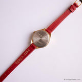 Chariot de ton or vintage par Timex montre Pour les dames avec une sangle rouge