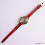 Carrozza tono d'oro vintage di Timex Guarda per donne con cinturino rosso