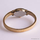 Óvalo de tono de oro vintage Timex reloj para mujeres con brazalete de tono de oro