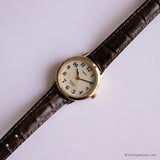 Tono de oro clásico Timex Indiglo reloj para mujeres con correa marrón vintage