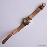 Antiguo Timex Damas indiglo reloj con correa floral marrón