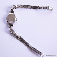 Silver watch with a chain-like bracelet on a white background