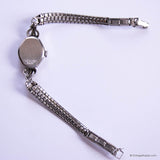 Silver watch with a chain-like bracelet on a white background