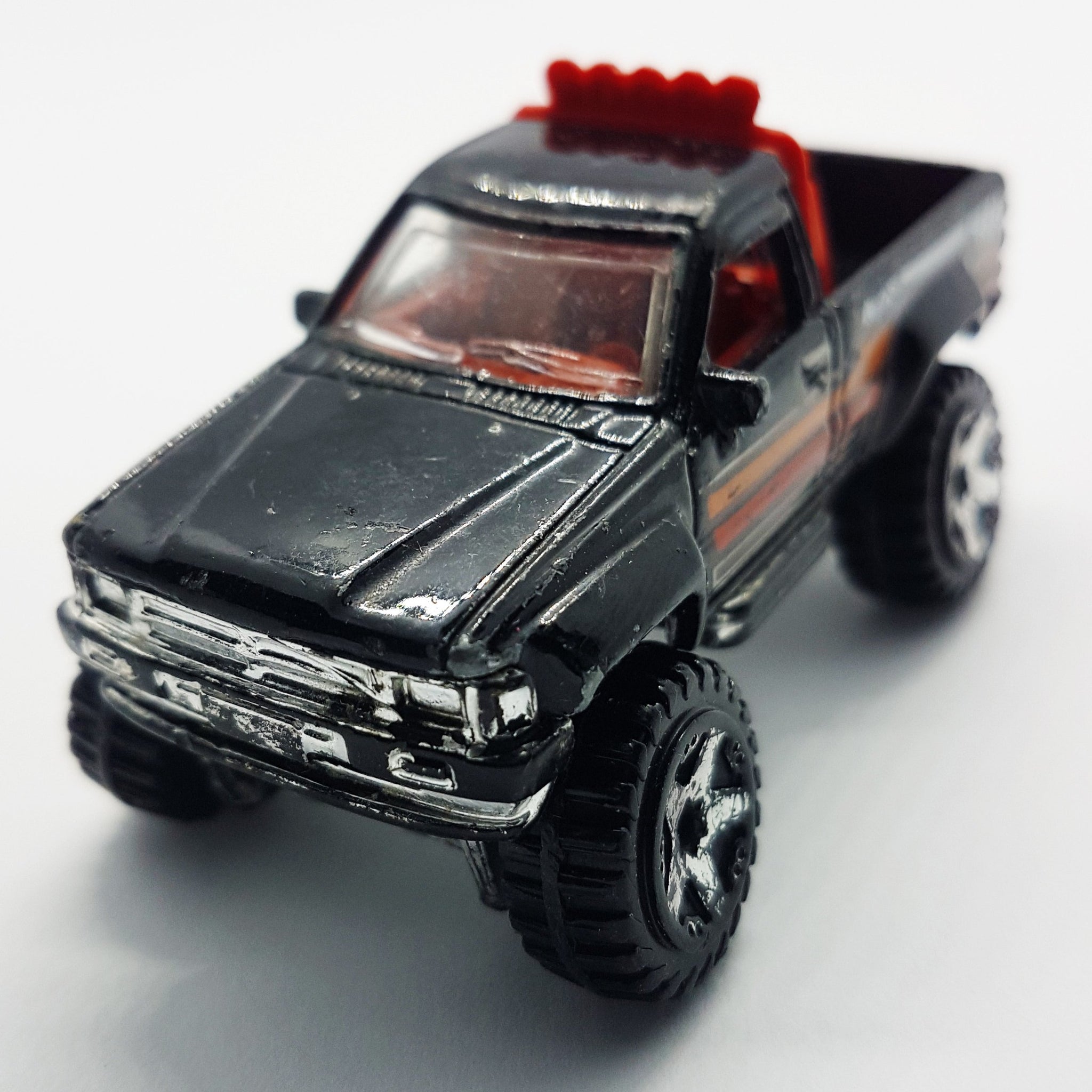 Hot Wheels Lot sold of 2 ‘87 Toyota Pickup Trucks