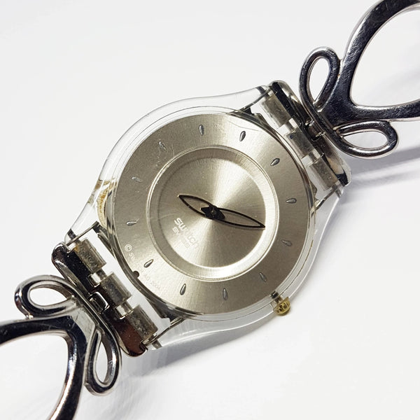 2004 ENLACEMENT SFK239G Skin Swatch | Silver-tone Swatch Watch - Vintage Radar
