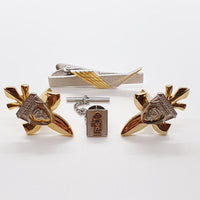Accessori vintage a due toni: gemelli per spada, clip e perno