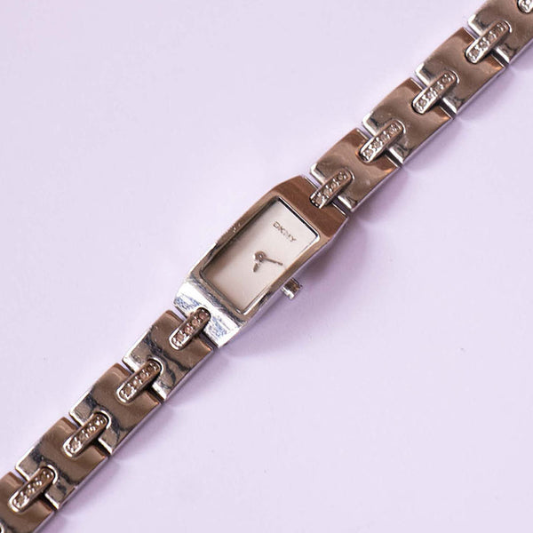 DKNY Pequeño tono plateado reloj para mujeres | Relojes para mujeres de marca
