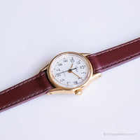 Pequeño tono de oro Timex reloj para damas | Elegante reloj de pulsera vintage