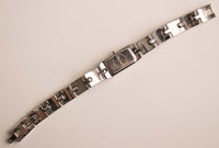 Diminuto DKNY Tono plateado reloj Para mujeres | Mejores relojes de cuarzo a la venta