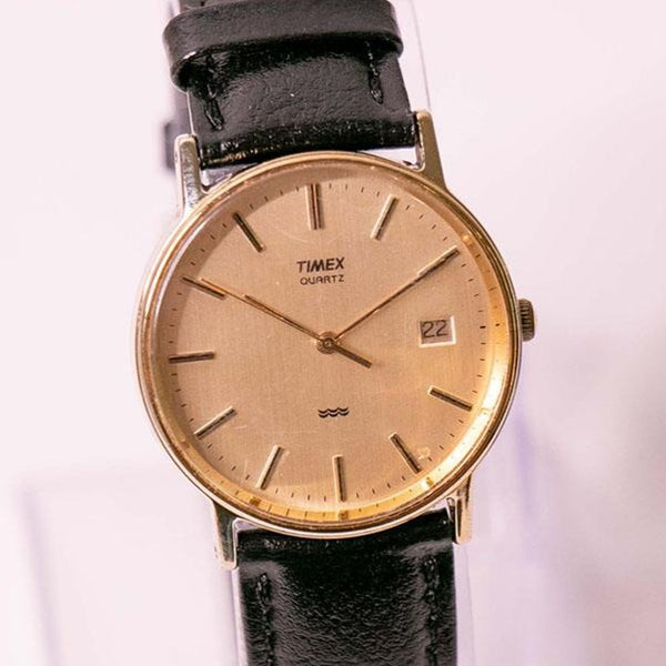 Millésime des années 90 Timex Quartz à tons d'or montre pour les hommes et les femmes